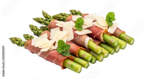 Fresh asparagus spears wrapped in thin slices of prosciutto ham, topped with shaved parmesan cheese and fresh mint leaves, isolated on transparent background