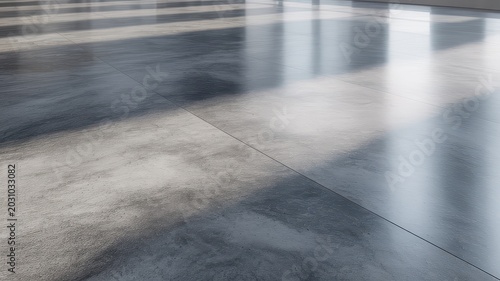 Reflective polished concrete floor with dramatic light and shadow patterns, modern architectural background