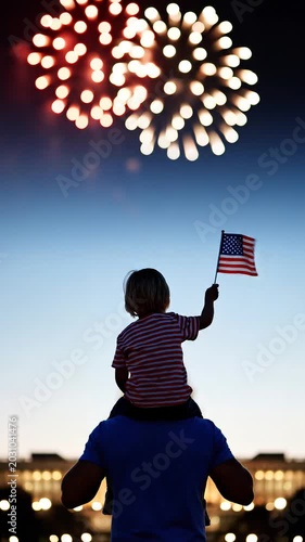 Child on Shoulders Waving American Flag Watching Fireworks Display on Independence Day Celebration