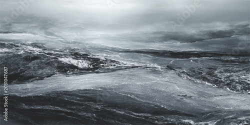 Принти на полотні A dramatic winter landscape where snow-covered mountains meet a rough stormy oce