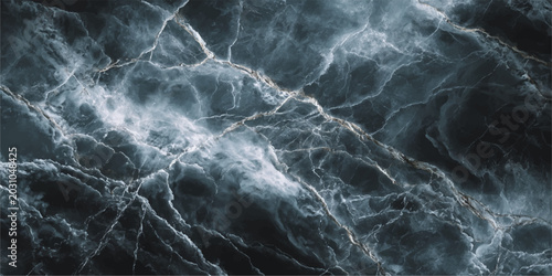 Quadro su tela A powerful blue lightning bolt strikes the liquid surface of a stormy sea at nig