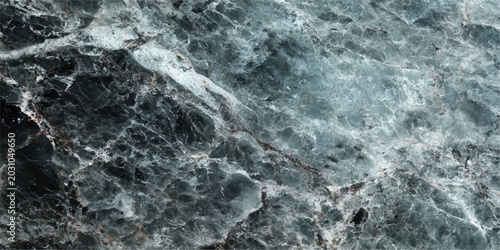 Schilderij op canvas A dynamic long-exposure shot captures white water flowing over dark river rocks,