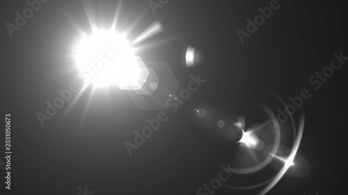 optical light ray loop animation on black screen. Sun rays view, sun spotlight glowing burst concept. optical light beams on black background. 