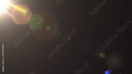 optical light ray loop animation on black screen. Sun rays view, sun spotlight glowing burst concept. optical light beams on black background. 