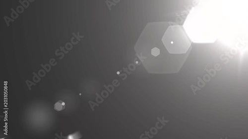 optical light ray loop animation on black screen. Sun rays view, sun spotlight glowing burst concept. optical light beams on black background. 
