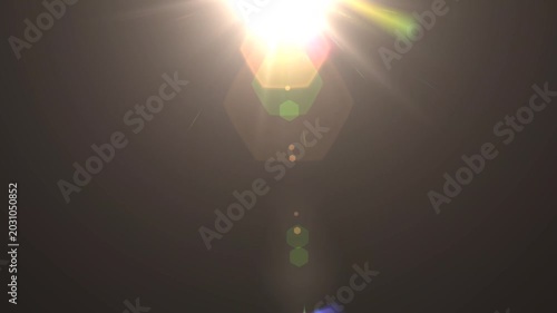optical light ray loop animation on black screen. Sun rays view, sun spotlight glowing burst concept. optical light beams on black background. 