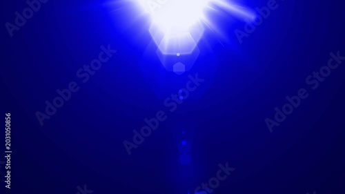 optical light ray loop animation on black screen. Sun rays view, sun spotlight glowing burst concept. optical light beams on black background. 