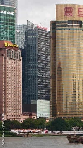 Modern buildings and skyscrapers in Shanghai's emerging market area with a focus on architecture and city life