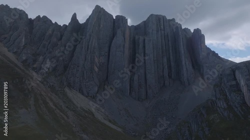 Aerial lateral tracking shot of Castillo de Vichaycocha in the high Andes of Lima, Peru