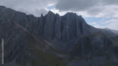Drone tilt up revealing Castillo de Vichaycocha rock formation in the high Andes of Lima, Peru