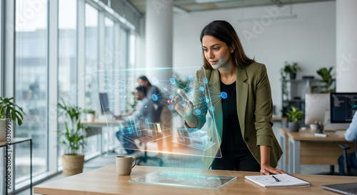 Businesswoman using artificial intelligence holographic interface for business analytics in contemporary office, digital transformation workflow, futuristic data visualization dashboard, innovation te