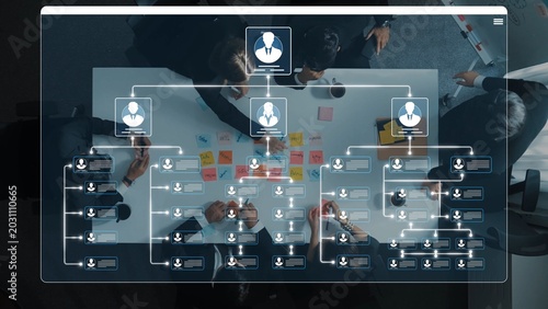 Foto Detailed Organization Chart with Team Structure and Collaboration on Modern Offi