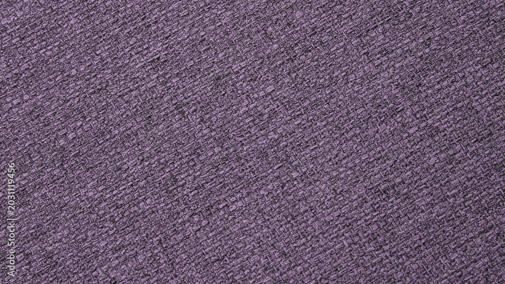 Fototapeta premium Purple furniture fabric texture with coarse weave
