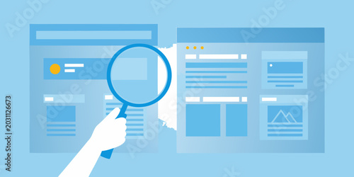 hand holding magnifying glass over web page layout