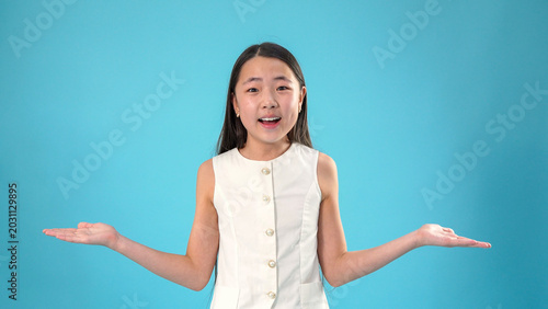 Young girl gesturing with hands