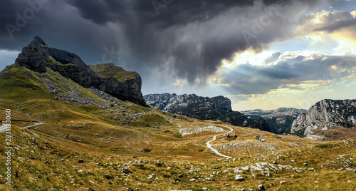 фотографія Sedlo Pass on Mount Durmitor in Montenegro with a mountain peak shaped like a ho
