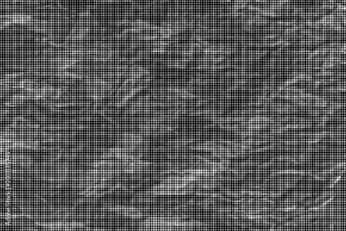 Vászonkép Close-up of a crumpled piece of paper with a rough texture