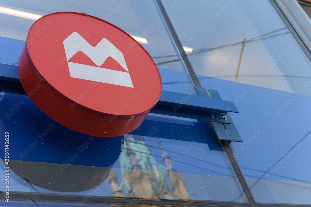 Naklejka premium corporate logo of BMO Bank of Montreal outside branch at 101 King St E, Toronto