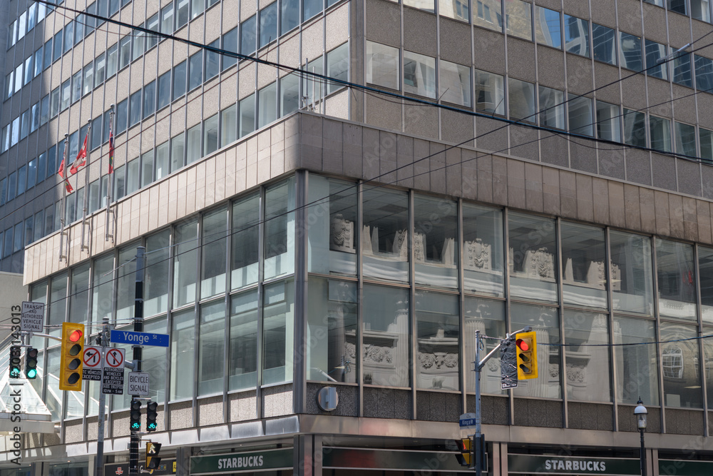 Fototapeta premium exterior of office building at 4 King St W (northwest corner of Yonge St), location of Starbucks Coffee Company, Toronto