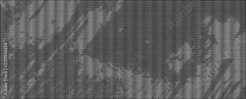A grayscale image of a distressed metal surface with a worn, peeling paint effect on a corrugated metallic background