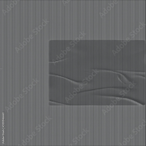 A close-up view of a textured surface with wavy lines on a flat area.