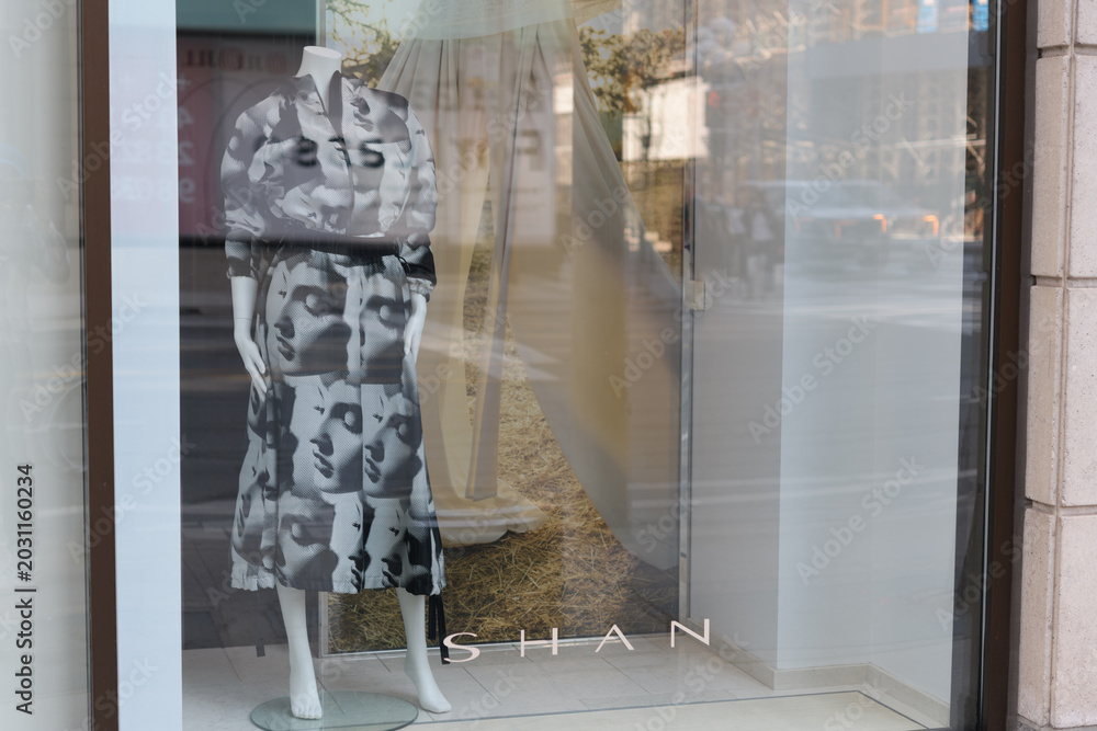 Naklejka premium display window of Shan, a clothing store, located at 38 Avenue Rd, inside Alixandre, featuring Spring/Summer 2026 Coll of Jacquard Printed Top and Printed Midi Skirt (Color 951 ELENA), Toronto