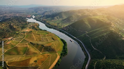 Douro Valley river cruise in Portugal featuring aerial views of vineyard landscapes and scenic river travel