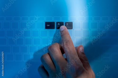 Photography Pressing an AI hotkey on a futuristic digital keyboard interface represents human interaction with AI generative prompts