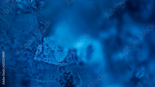 Tableau sur toile Luminescence of rare arctite crystal under ultraviolet light macro shot from Khi