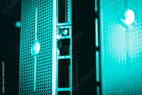 Plakat Futuristic glowing server front panel Abstract technology background representing cybersecurity web hosting and network infrastructure.