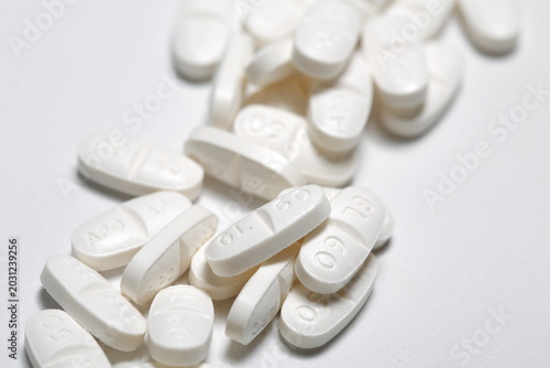 Medication diabetes gliclazide MR 60mg white oblong tablet, white background close up
