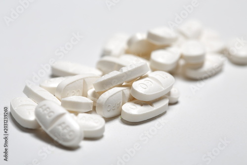 Gliclazide MR 60mg white oblong tablet white background close up type 2 diabetes