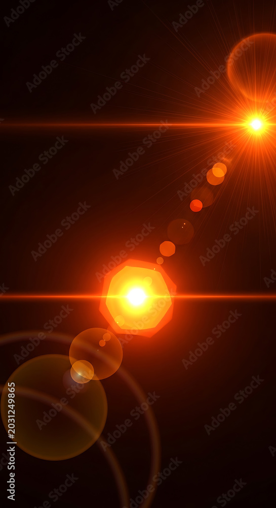 Fototapeta premium Vibrant orange and yellow lens flares creating an abstract light effect on a dark background.