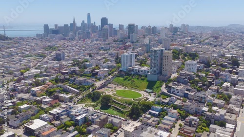 San Francisco Russian Hill Aerial Pullback With Downtown Skyline and Park