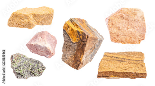 Bild auf Leinwand Assorted raw mineral specimens and natural rough-cut rocks, featuring diverse textures, on transparent background