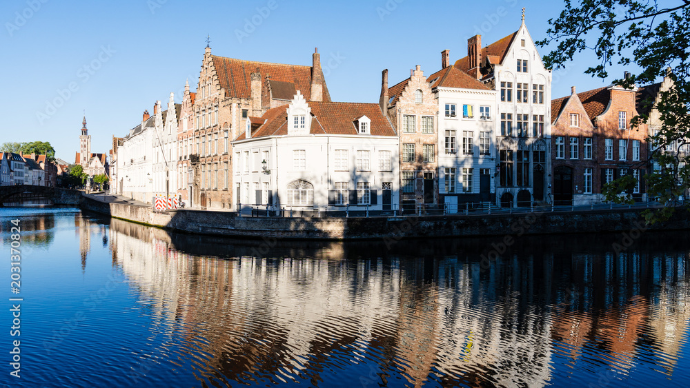 Naklejka premium Red Brick Medieval Buildings by Bruges Canal