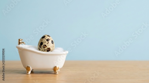 Cute quail egg bathtub still life