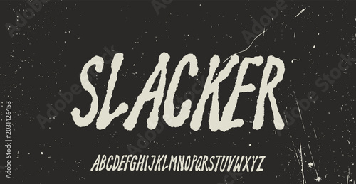 Fényképezés “Slacker” is a bold hand-drawn brush alphabet featuring rough edges, distressed texture, and expressive lettering style
