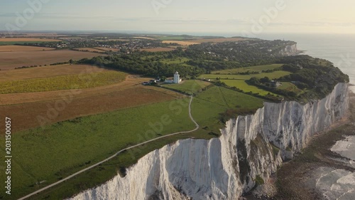 Aerial view of South Foreland Lighthouse on the White Cliffs of Dover overlooking the English Channel and green fields Saint Margaret's at Cliffe, England, United Kingdom.