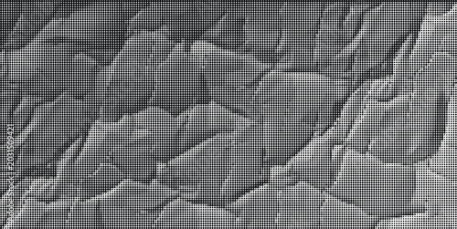 Fotografie The cracked dry earth landscape shows a desolate terrain with rugged surface