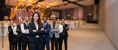 Female event planner with luxury event management team, coordinators, decorators, production staff, hospitality professionals, corporate events, banquet venue, wedding planning, entertainment industry