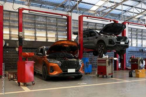 Damaged Car Under Repair in Professional Auto Service Garage