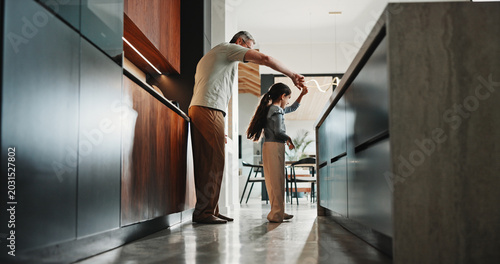 Fotografía Dance, dad or girl in kitchen with bonding together, childcare or fun time in healthy relationship