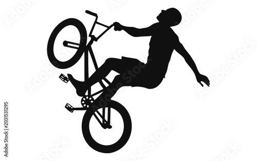 Photos BMX rider doing a wheelie stunt with one hand silhouette isolated on white backg