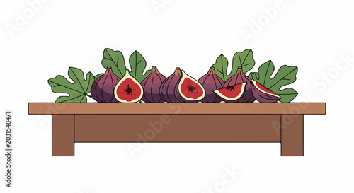 A line of ripe, cut figs with leaves on a wooden table