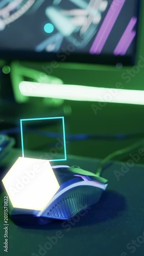 Vertical video: After pause neon shapes appearing rotating over wired gaming mouse boosting glow