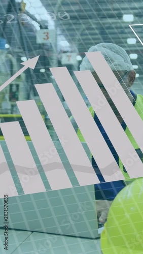 Vertical video: Plant tech typing laptop, starting data overlays and analyzing charts for ops