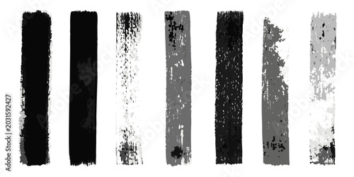 Fotografie eight monochrome charcoal brush strokes on a pure white background
