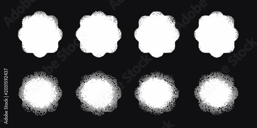 Fotografie Ten luminous organic blob shapes in pure white against a black background