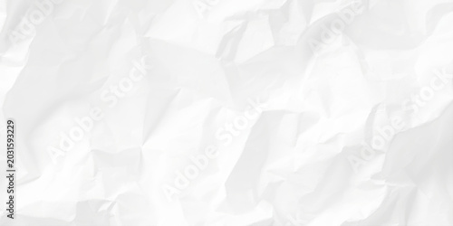 Foto Crumpled white paper texture background with creases and folds